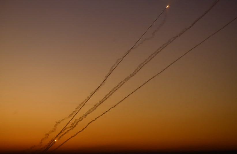  Rockets fired from Gaza head towards Israel, at the Israeli-Gaza border, amid the ongoing conflict between Israel and the Palestinian Islamist group Hamas, as seen from Southern Israel, December 15, 2023. (photo credit: REUTERS/CLODAGH KILCOYNE)