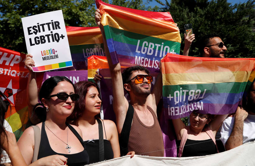  Turkey's LGBTQ+ community gather for a Pride parade, which was banned by local authorities, in Istanbul, Turkey June 30, 2024. (photo credit: REUTERS/DILARA SENKAYA)