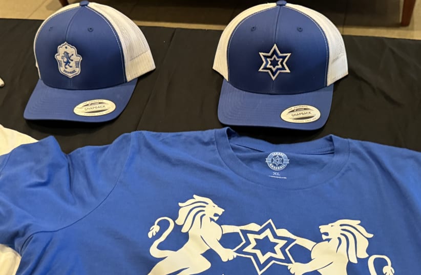  One of Israel baseball swag on display at film premiere and one of filmmaker Daniel A. Miller and Team Israel's Nate Fish (photo credit: HOWARD BLAS)