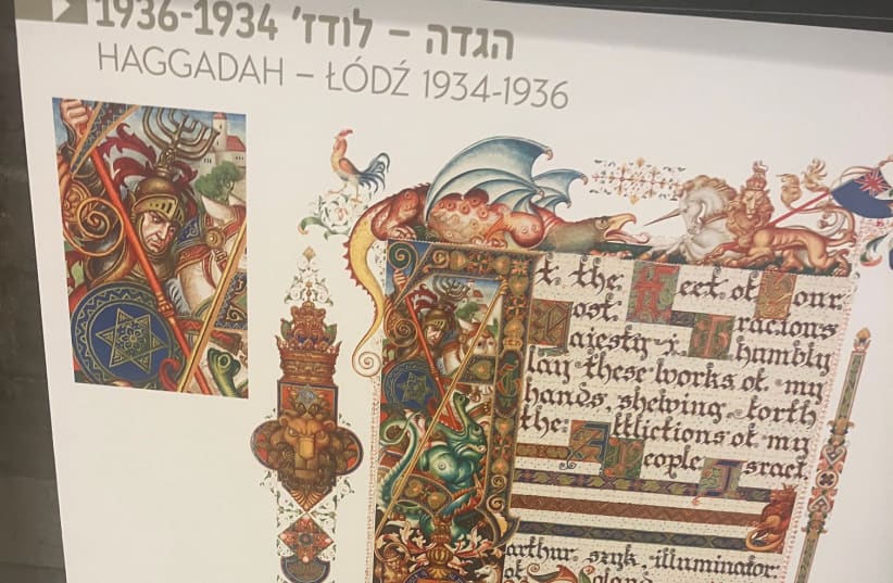  A CLOSE-UP of a page from Arthur Szyk’s famed Haggadah that includes a dedication to King George VI signed: Arthur Szyk, an illuminator of Poland. (photo credit: DAVID GEFFEN)