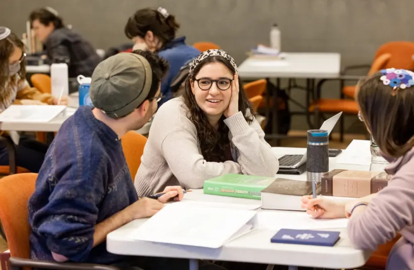Yael Jaffe, a member of Hadar's first cohort of rabbinic ordinees, learns in the New York beit midrash, or study hall, of the Jewish learning and programming center.  (photo credit: Courtesy Hadar)