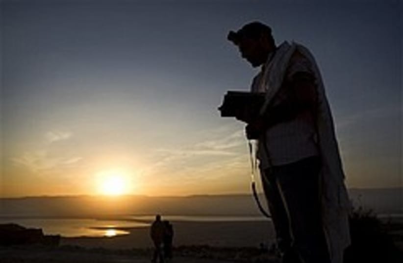 sunrise masada pray 248 88 ap (photo credit: AP)