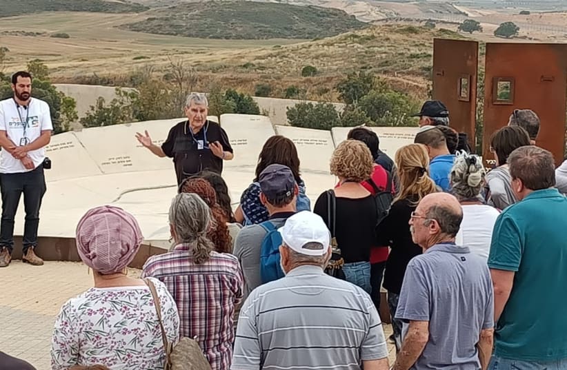  Tour group at memorial sight for fallen soldiers. (photo credit: courtesy of 