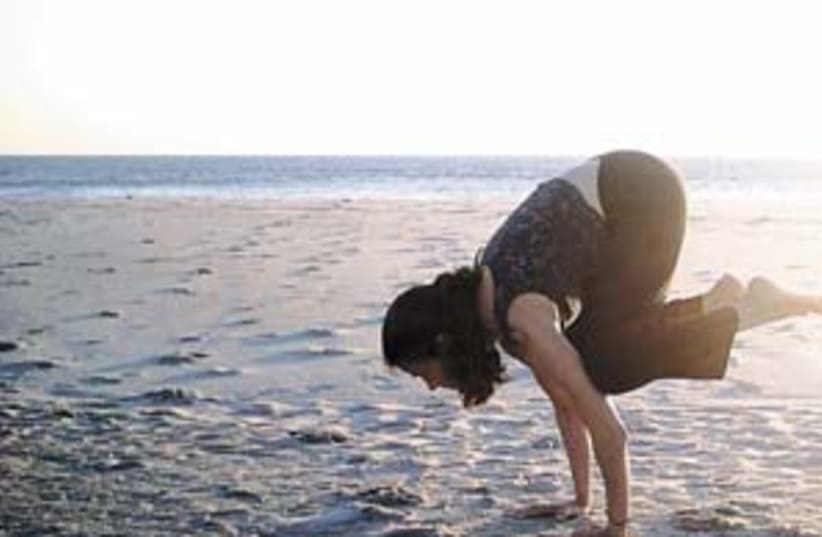 yoga on beach 298.88 (photo credit: )