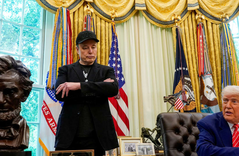 U.S. President Donald Trump and Elon Musk attend a press conference in the Oval Office of the White House in Washington, D.C., U.S., May 30, 2025. (photo credit: Nathan Howard/Reuters)