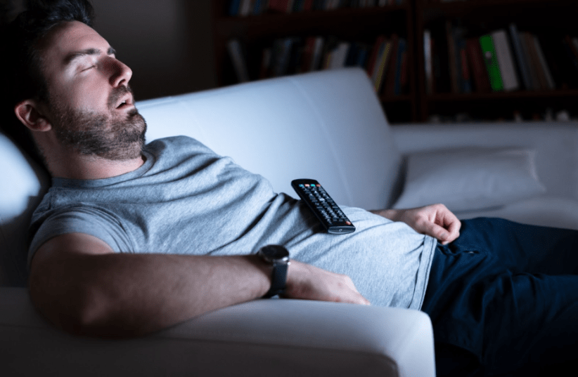  Study Warns: TV may be disrupting your sleep cycles. Illustration. (photo credit: F01 PHOTO. Via Shutterstock)