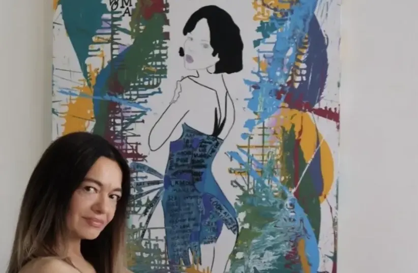  Artist Sigal Hen with a piece from her 