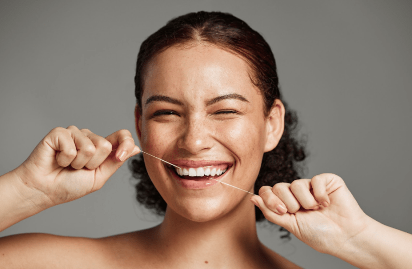  Saliva-savvy smart floss is a stress-tracker. Illustration. (photo credit: PeopleImages.com - Yuri A. Via Shutterstock)