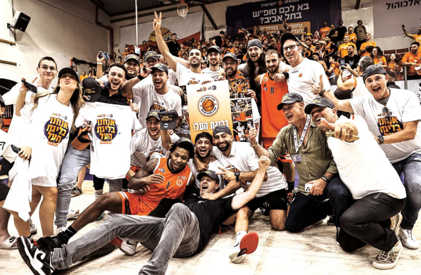  MACCABI RISHON LEZION celebrates after defeating Hapoel Eilat in Game 5 of the Leumit League final to capture the title. (photo credit: IBBA/Courtesy)
