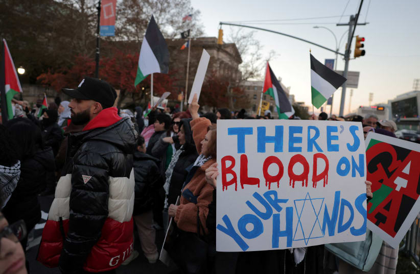  People gather during a rally held in support of Palestinians, amid the ongoing conflict between Israel and the Palestinian Islamist group Hamas, in Staten Island, New York, US, November 14, 2023.  (photo credit: REUTERS/ANDREW KELLY)