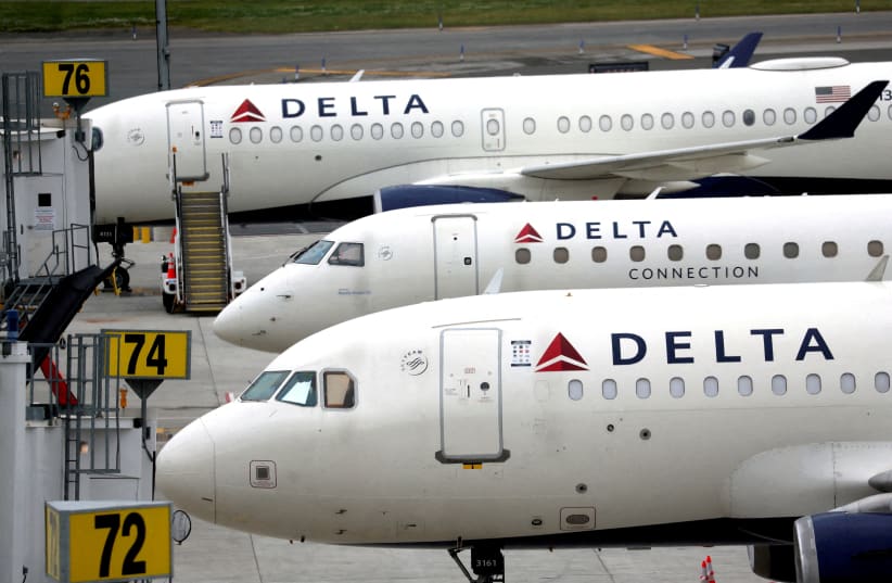  FILE PHOTO: Delta Airlines passenger jets are pictured outside the newly completed 1.3 million-square foot $4 billion Delta Airlines Terminal C at LaGuardia Airport in the Queens borough of New York City, New York, US, June 1, 2022. (photo credit: REUTERS/MIKE SEGAR/FILE PHOTO)
