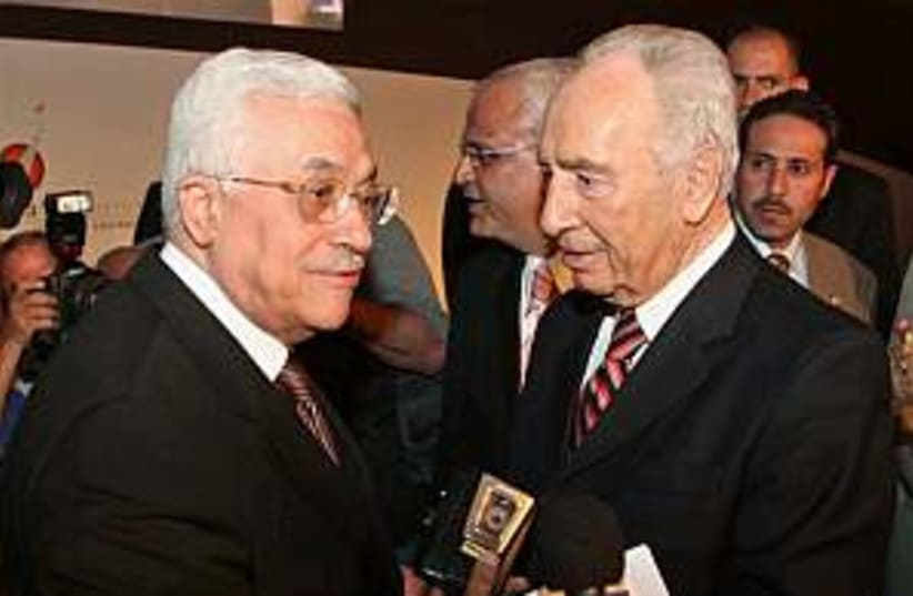 peres with abbas in petr (photo credit: AP)