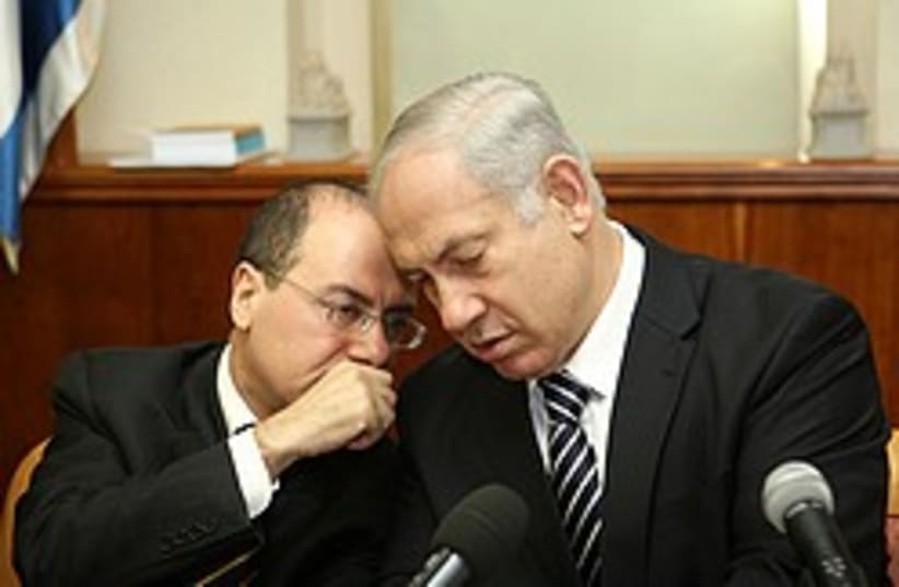 Prime Minister Binyamin Netanyahu listens to Minis (photo credit:  Ariel Jerozolimski)