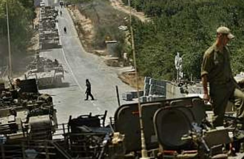 idf tanks on northern bo (photo credit: AP)