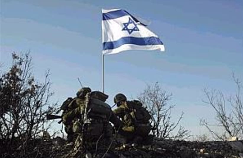 idf israeli flag lebanon (photo credit: AP)