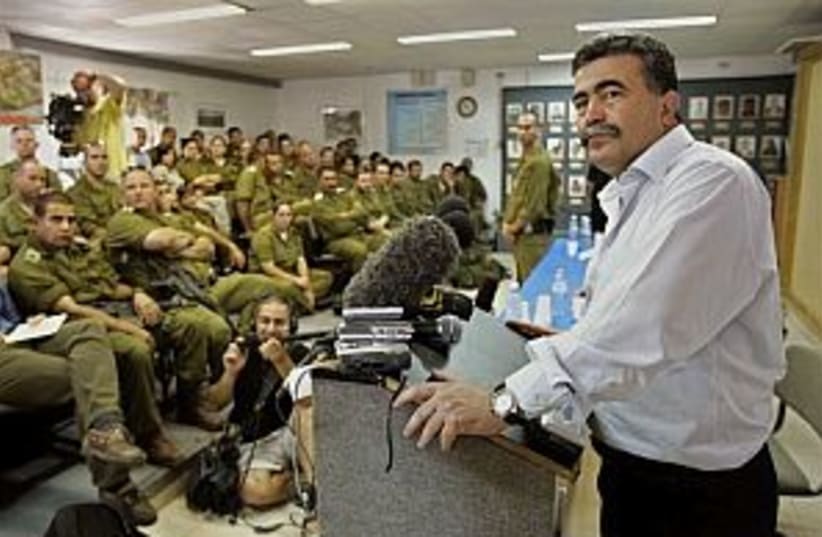 peretz talks troops 298. (photo credit: AP [file])
