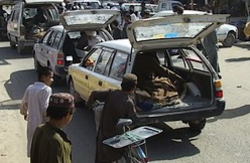 dead afghan in trunk (photo credit: AP)