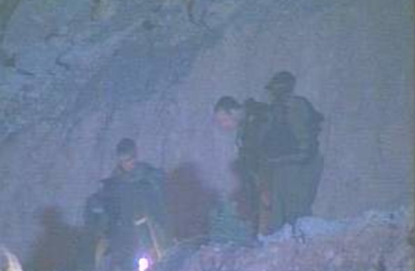 troops search 298.88 (photo credit: Channel 10)