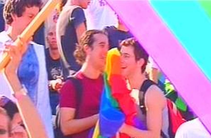 gay rally couple 298.88 (photo credit: Channel 2)