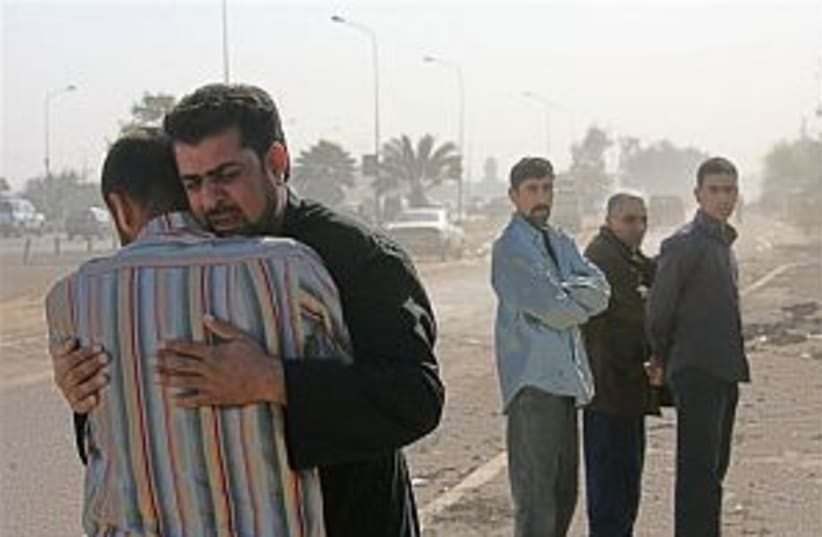 iraq mourning 298.88 ap (photo credit: AP)