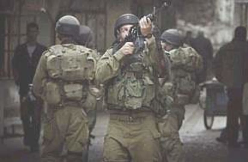 troops in hebron very ni (photo credit: AP [file])