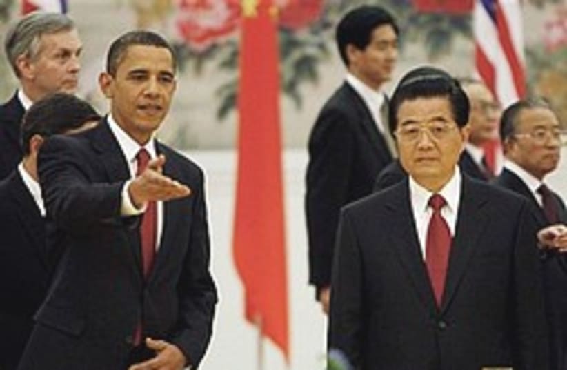 Hu Jintao gestures to Obama 248.88 (photo credit: )
