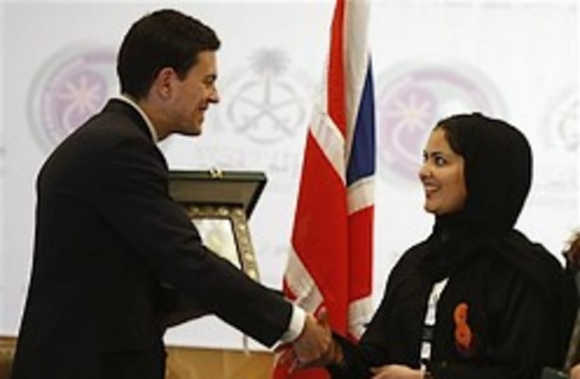 miliband with saudi woman 248.88 (photo credit: AP)