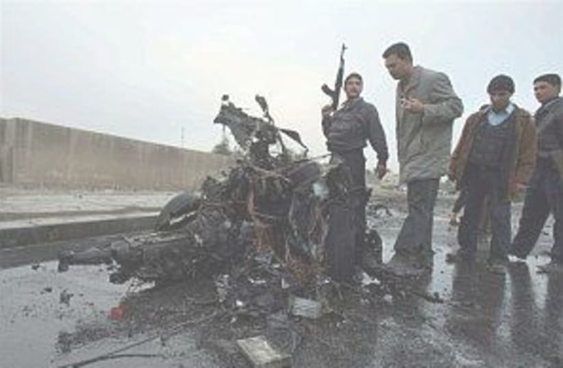 iraq triple bomb 298.88 (photo credit: AP)