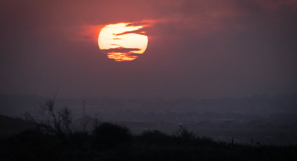  The sun sets over Gaza as seen from the Israeli side, October 31 2023.  (photo credit: FLASH90/CHAIM GOLDBERG)