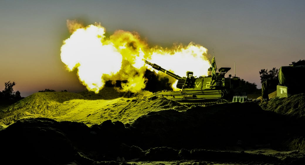  Israeli artillery unit firing shells towards the Gaza Strip, in southern Israel, December 19 (photo credit: FLASH90)