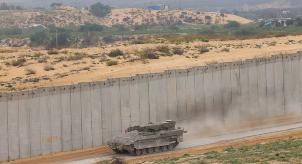  A military vehicle drive on the Israeli border with the Gaza Strip, on December 21, 2023 (photo credit: YOSSI ZAMIR/FLASH90)