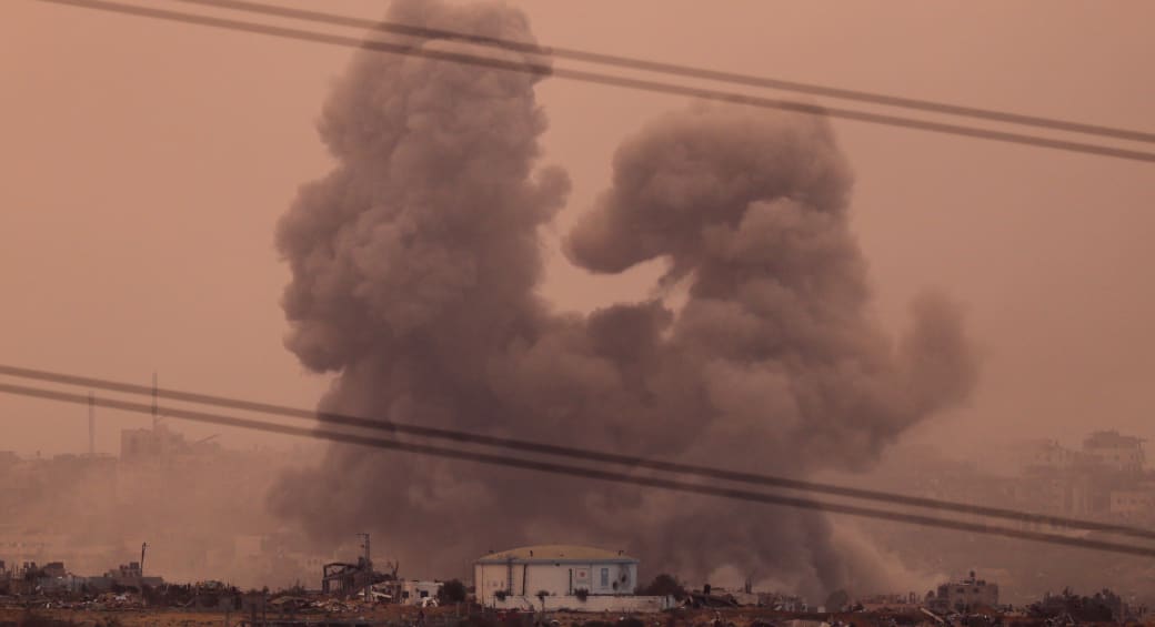 Smoke rises over Gaza, as seen from southern Israel, December 24, 2023 (photo credit: REUTERS/VIOLETA SANTOS MOURA)