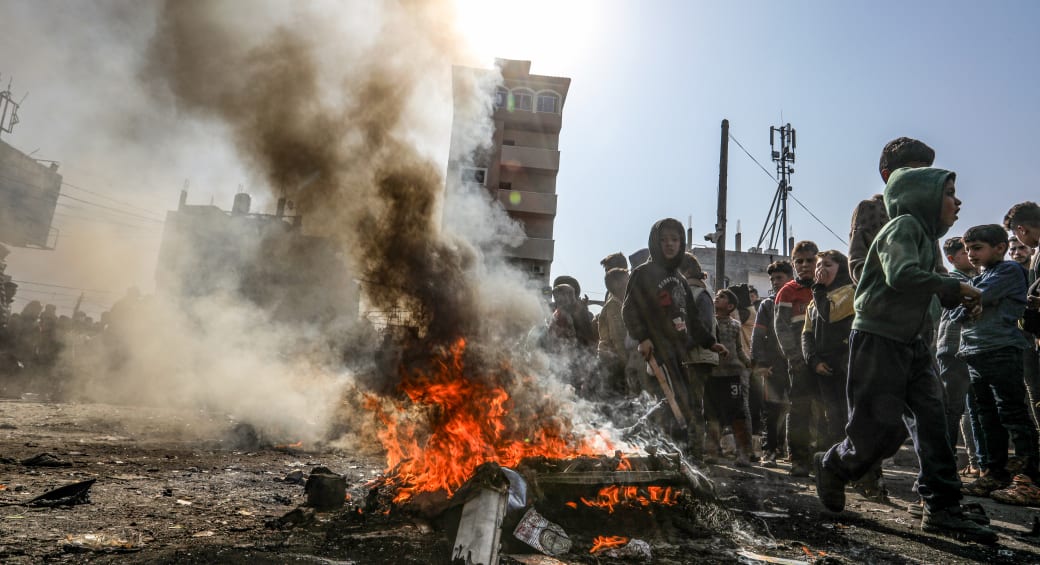 Palestinians burn tires during a protest against Hamas in Rafah, in the southern Gaza Strip, on February 28, 2024 (photo credit: ABED RAHIM KHATIB/FLASH90)