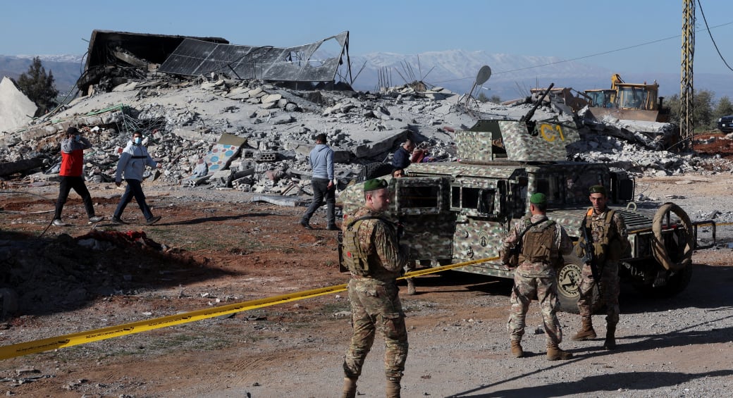 Lebanese army soldiers secure a site that was hit by a strike, after Israeli jets hit Lebanon's Bekaa Valley for a second day on Tuesday, according to security sources, in Saraain, Lebanon March 12, 2024. (photo credit: MOHAMED AZAKIR/REUTERS)