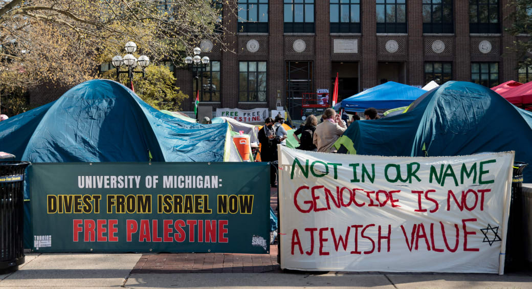  A coalition of University of Michigan students camp at an encampment in the Diag to pressure the university to divest its endowment from companies that support Israel or could profit from the ongoing conflict between Israel and Hamas on the University of Michigan college campus in Ann Arbor. (photo credit: REUTERS/REBECCA COOK)