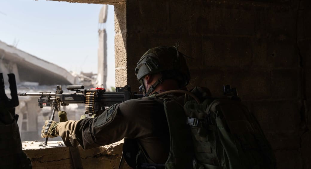  An IDF soldier operates a light machine gun in the Gaza Strip. June 6, 2024. (photo credit: IDF SPOKESPERSON'S UNIT)