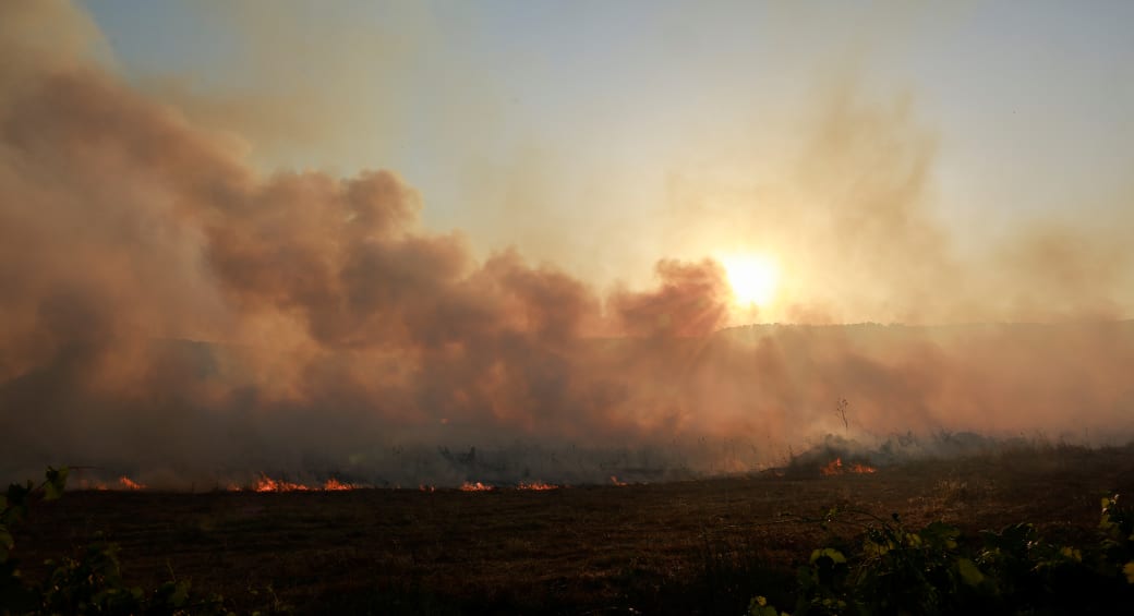  Smoke rises as flames burn, amid ongoing cross-border hostilities between Hezbollah and Israeli forces, in Dishon, near Kiryat Shmona, northern Israel, June 4, 2024.  (photo credit: REUTERS/AMMAR AWAD)