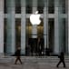 FILE PHOTO: The Apple Inc. logo is seen hanging at the entrance to the Apple store on 5th Avenue in Manhattan, New York, U.S., October 16, 2019
