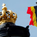 A Belgian national flag flies over the Royal Palace