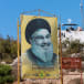  HEZBOLLAH LEADER Sayyed Hassan Nasrallah smiles smugly from a poster in Marwahin, southern Lebanon. 