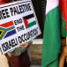  A boy holds a Palestinian flag during a demonstration to express support for the people of Palestine, in Cape Town, South Africa, October 9, 2023.