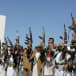  Houthi supporters hold up their rifles as they take part in a pro-Palestinian protest in Sanaa, Yemen February 18, 2024.