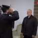 Officer Nasrallah salutes the Undersecretary of Hamas' Interior Ministry, General Nasser Maslah (ruc.edu.ps, March 13, 2023)