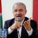  Palestinian Prime Minister Mohammad Shtayyeh speaks as he visits after Israeli settlers' rampage in Hawara, Israeli-occupied West Bank March 1, 2023. 