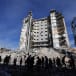  Palestinians gather near a building damaged in an Israeli airstrike in Rafah, in the southern Gaza Strip March 9, 2024