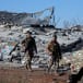  Lebanese army soldiers secure a site that was hit by a strike, after Israeli jets hit Lebanon's Bekaa Valley for a second day on Tuesday, according to security sources, in Saraain, Lebanon March 12, 2024.
