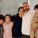 Avihai Brodutch poses with his wife Hagar Brodutch, 40, and their children Oria Brodutch, 4, Yuval Brodutch, 8, and Ofri Brodutch, 10, shortly after Hagar and their children arrived in Israel on November 26 after being held hostage by the Palestinian militant group Hamas in the Gaza Strip, at Schnei