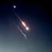  Missiles fired at Israel are seen in the sky over Amman, Jordan on April 14, 2024, in this screen grab obtained from a social media video. 
