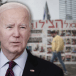  US President Joe Biden seen over a wall of hostage posters in Tel Aviv (illustrative)