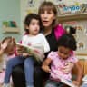 Livnat with children at daycare.